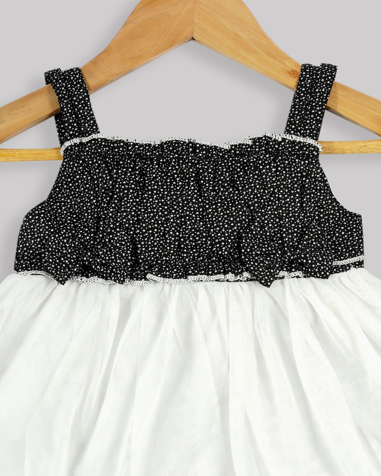 Best kidswear brand in india.Casual printed frock Frilled yoke with plain net bottom