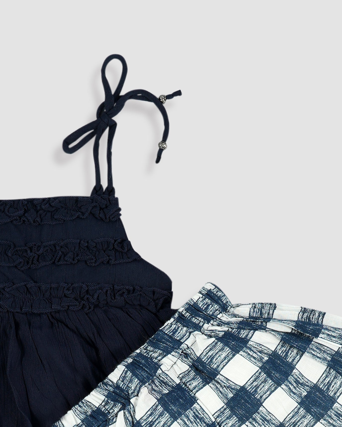 Best kidswear brand in india. Kids girls two piece set Ruffled peplum top with checkered shorts