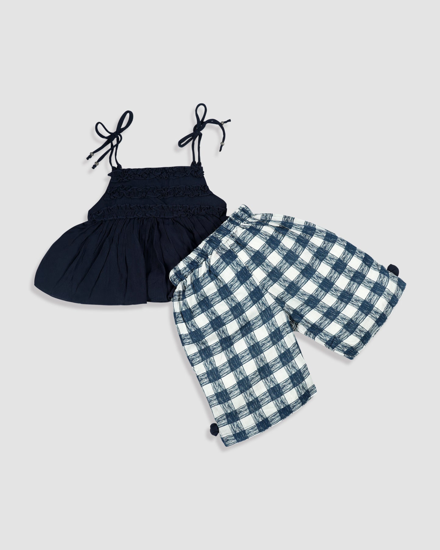 Best kidswear brand in india. Kids girls two piece set Ruffled peplum top with checkered shorts