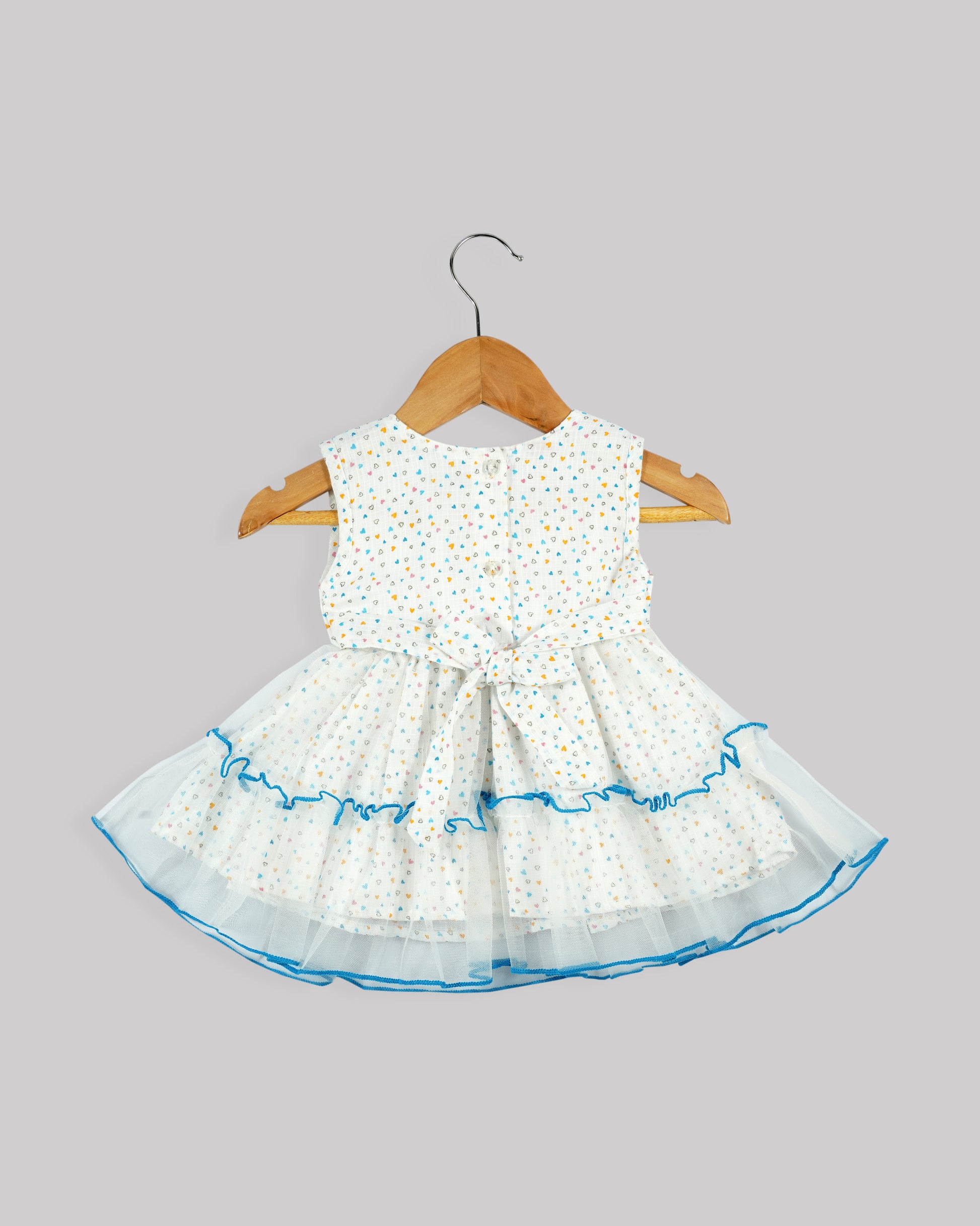 Best kidswear brand  in india. Kids tiered frock Heart print bow detail tiered dress with contrast baby lock stitch 