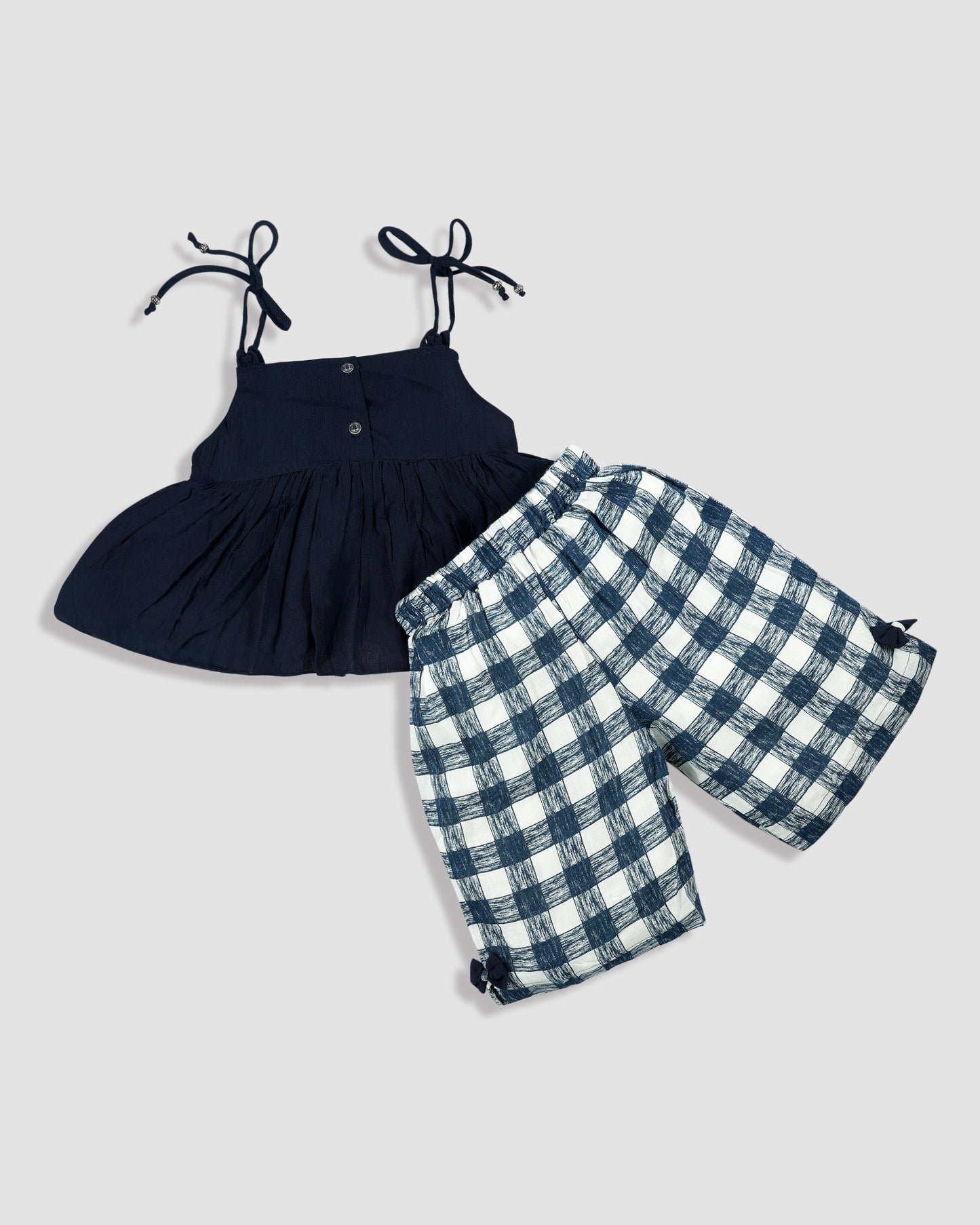 Best kidswear brand  in india. Kids girls two piece set Ruffled peplum top with checkered shorts