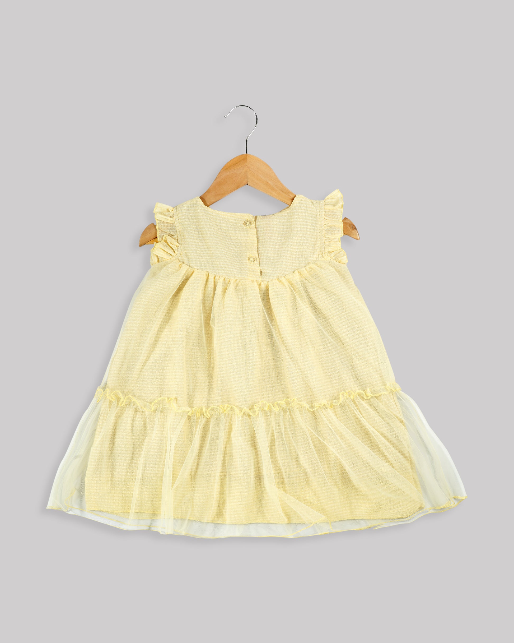 Best kidswear brand in india. kids tiered frock Self print chiffon with plain net tiered frock