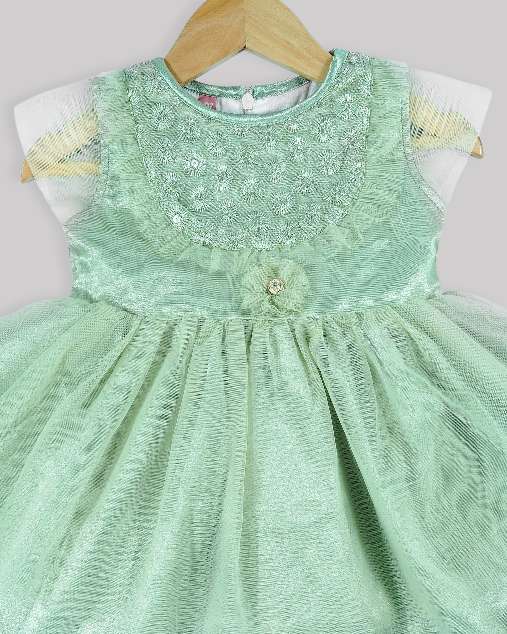 Best kidswear brand  in india. kids party wear dress Thread work yoke with frill and double layered net bottom 